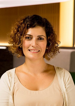 Brown haired woman in an office